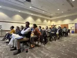 Side view of conference participants