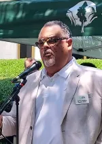 Jeffrey Robbins speaks at a news conference
