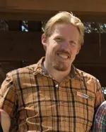 Picture of a man in a plaid shirt