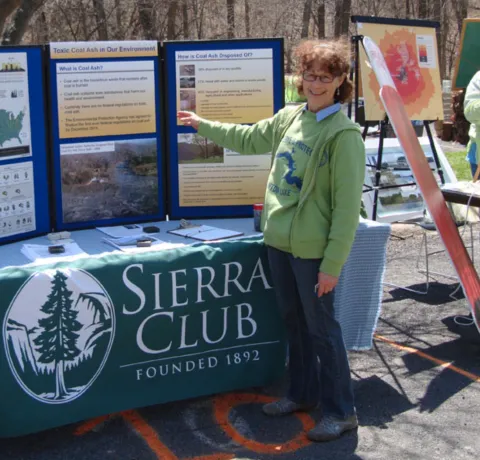 Joyce Blumenshine tabling