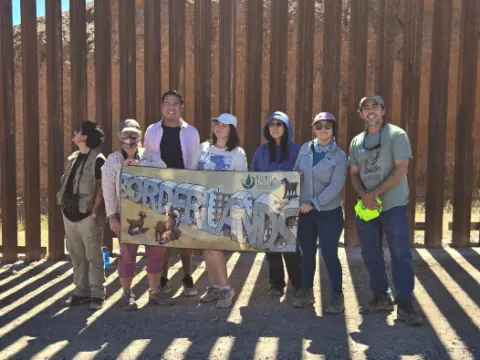 group at border wall