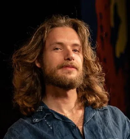 Headshot of Belvin Olasov