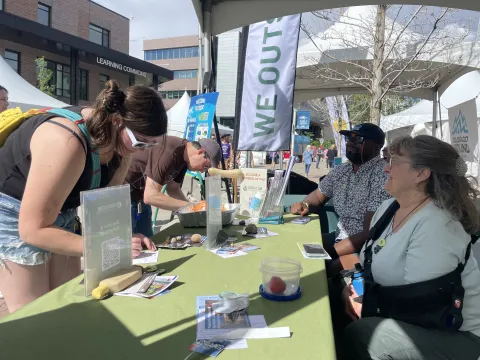 A group of Sierra Club volunteers at a tabling event