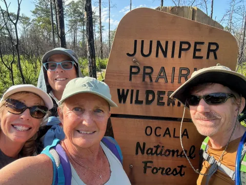 Smiling faces at Juniper Prairie Wilderness area in Ocala National Forest