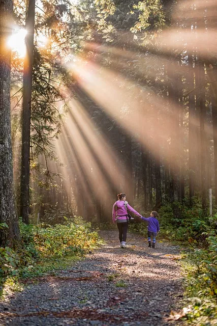 woman and child in forest