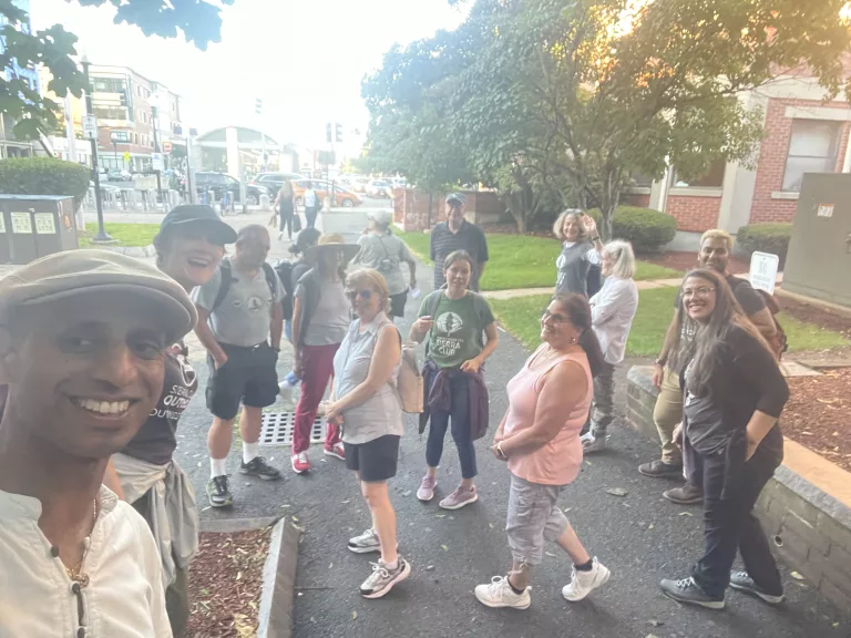 A group of people standing outside in East Boston