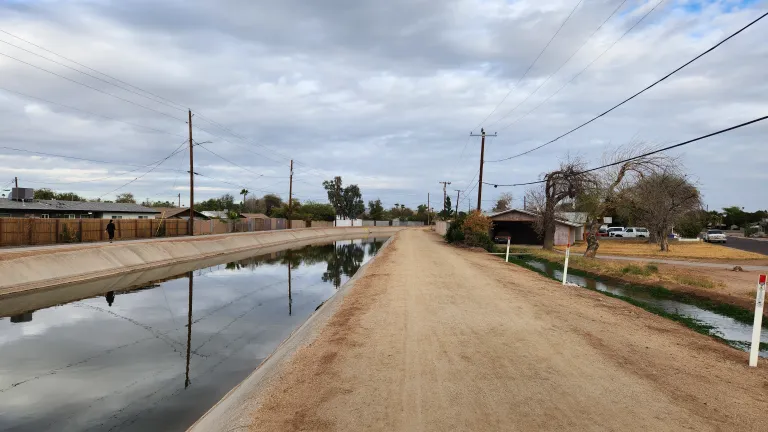 a canal and a dirt path