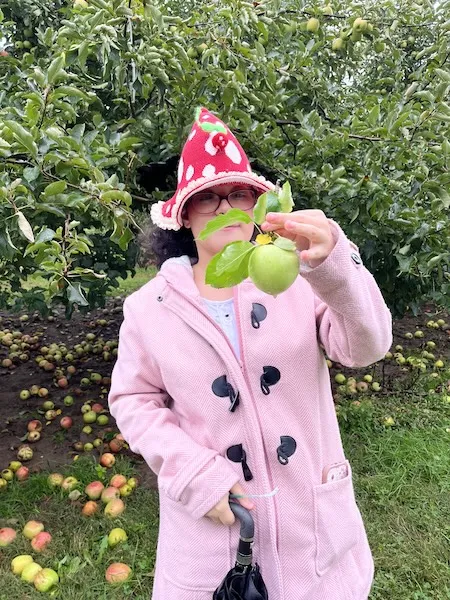 Student apple picking. 