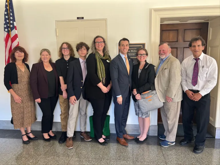 2024 Farm Bill Fly In Volunteers with Representative McGarvey outside his office door.