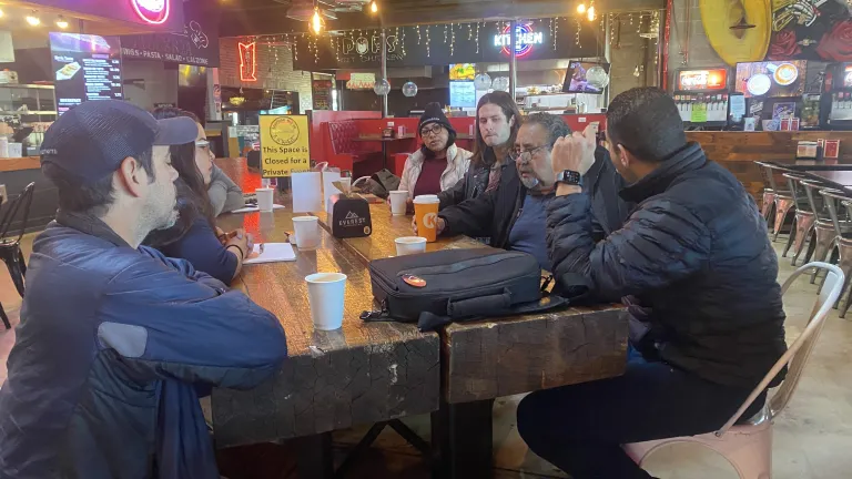 a group sitting around a table