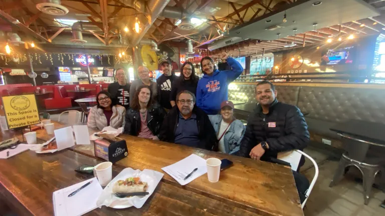a group poses for a photo