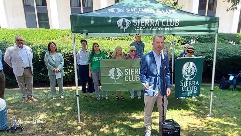 NC Sierra Club Director Chris Herndon speaks at a news conference outside the NC General Assembly