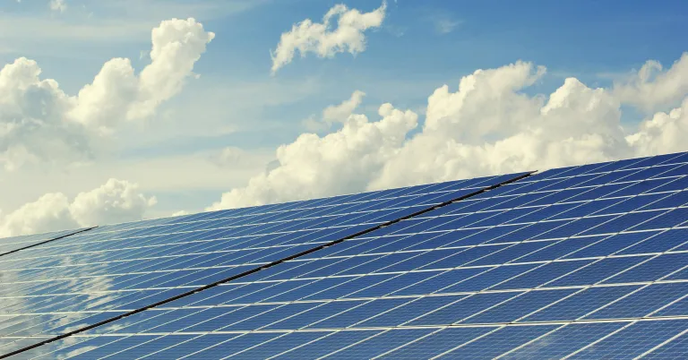 Solar panels against blue sky