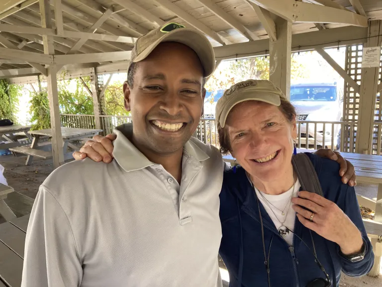 Joe Neguse with IPG member Becky Dickson