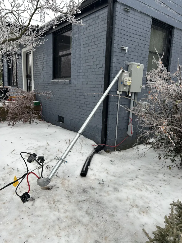 Power pole down on the ground