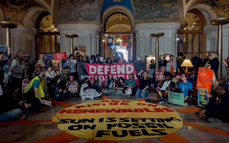 Activists convene in the state capitol buidling's War Room. 