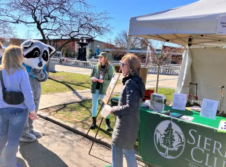 SEMG volunteers pose Environmental Jeopardy questions to Zoo volunteer Frank Raccoon during the Zoo’s Greenfest.	