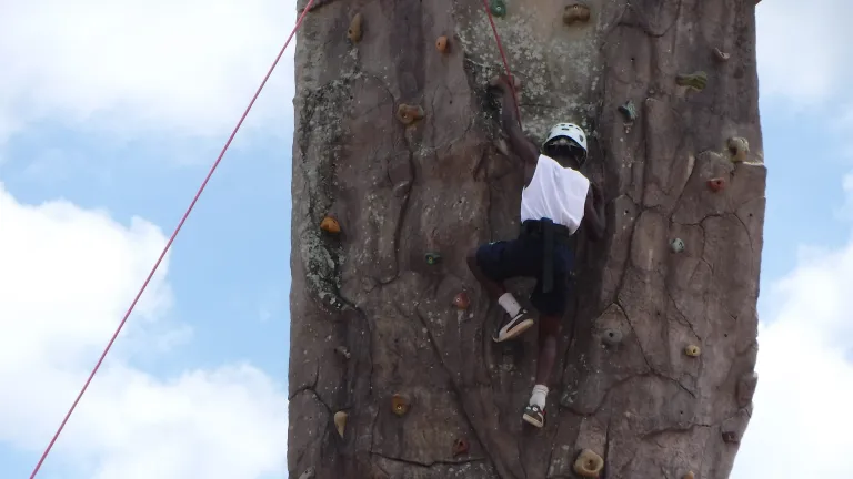 ICO kid climbing rock wall