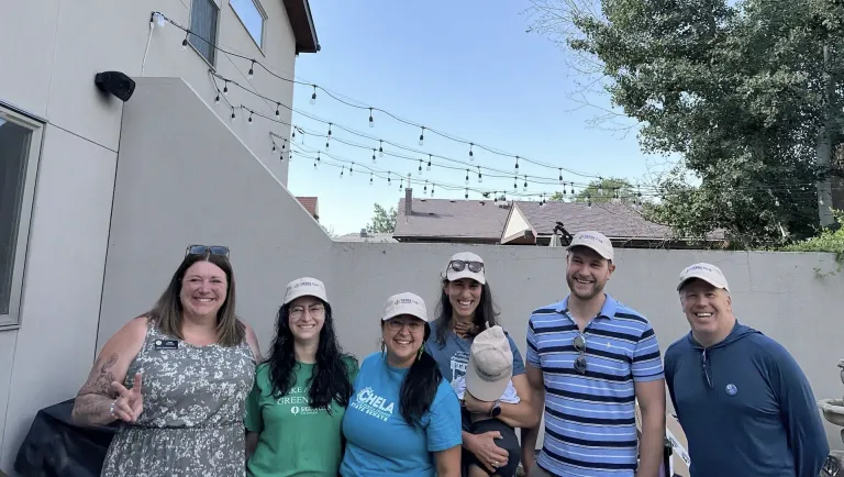 A group of staff and volunteers with an endorsed candidate 