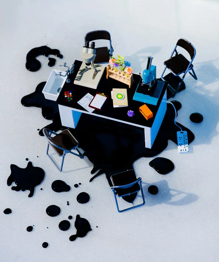 A desk covered in oil. Photo illustration by Tonje Thilesen for ProPublica