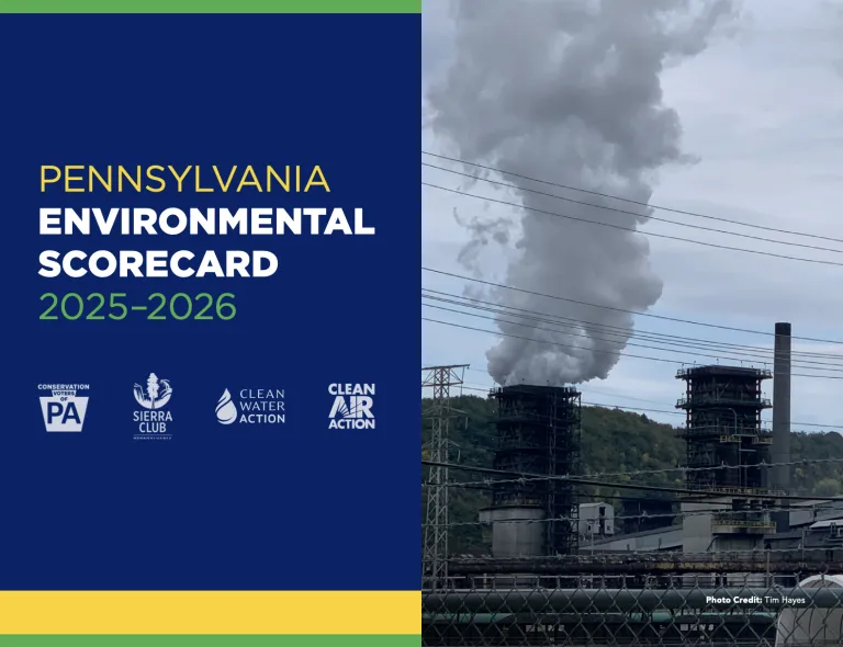 Smoke cloud coming out of a smoke stack at a dirty energy plant. The title of the document, "Pennsylvania Environmental Scorecard 2025-2026" is next to it in a blue block..