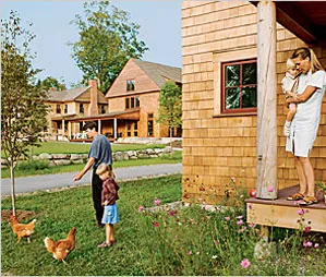 Noel White, Johanna Wilson-White, and their two children enjoy Nubanusit's car-free common areas