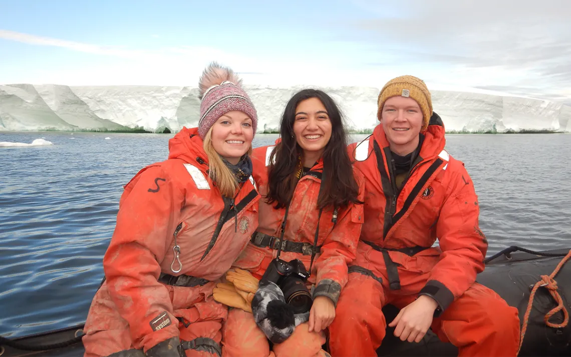  Rachel Clark, Asmara Lehrmann, and Michael Comas, members of the Thwaites Offshore Research (THOR) team, pose for a photo in the Amundsen Sea.  Photo by Photo by Rick Petersen | NSF