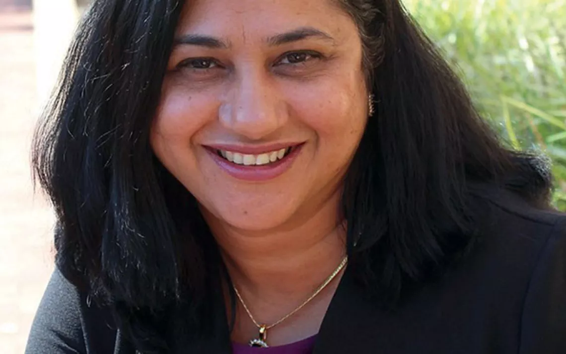 Shruti Bhatnagar smiles at the camera.