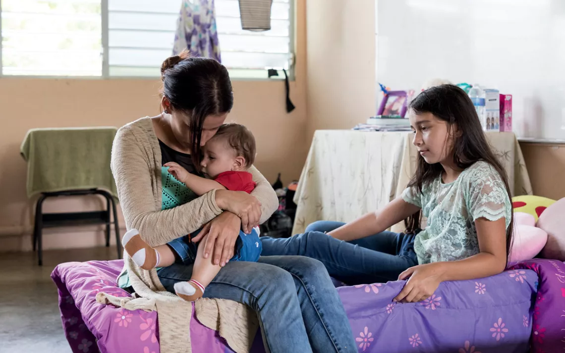 Yesenia Ramos Cintrón and her family lived in a shelter while waiting for assistance from FEMA.