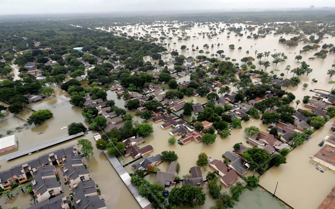 A Houston neighborhood flooded by rain from Tropical Storm Harvey in 2017. Photo by David J. Phillip | AP File