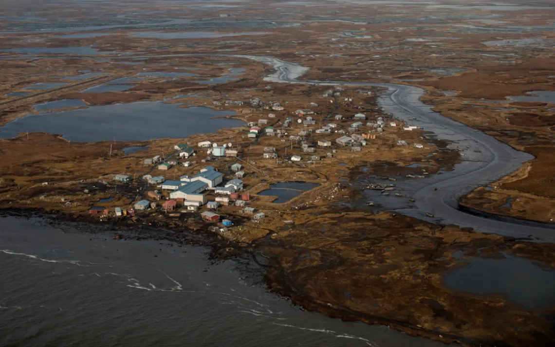 Warming temperatures from climate change are making the permafrost and tundra surrounding Newtok, Alaska, increasingly unstable.