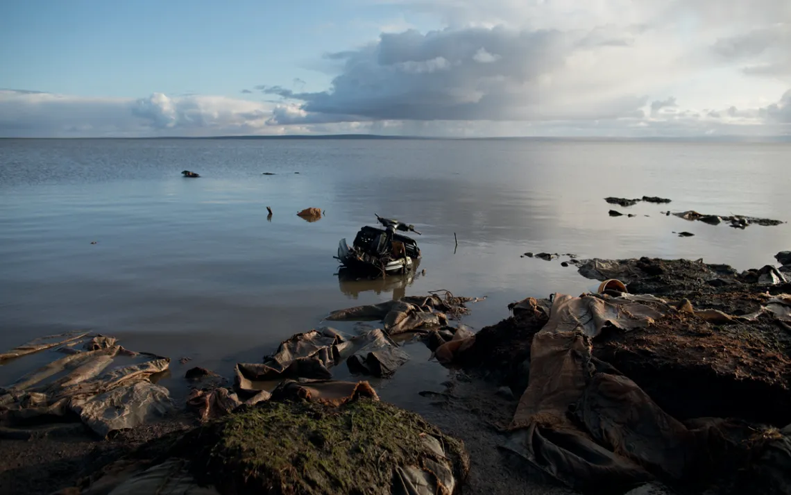 The land surrounding Newtok is littered with detritus from homes lost to erosion.