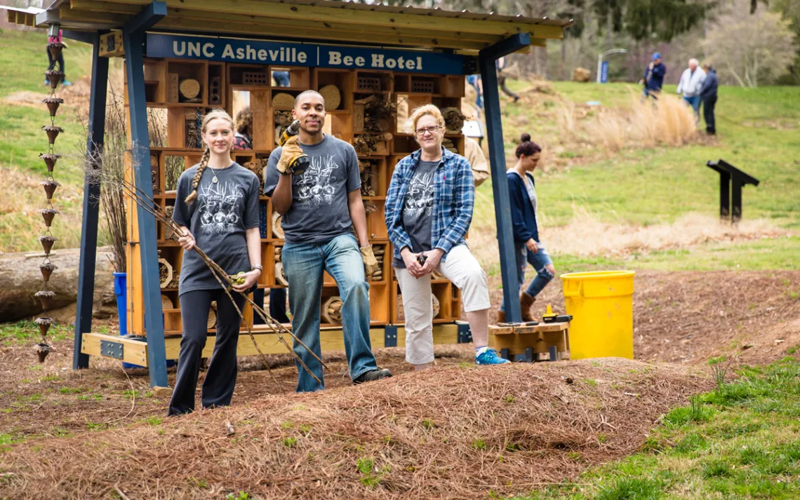 Bee Hotel stewards at UNC Asheville's Bee Hotel (campus volunteers regularly clean it out and restock nesting supplies) 