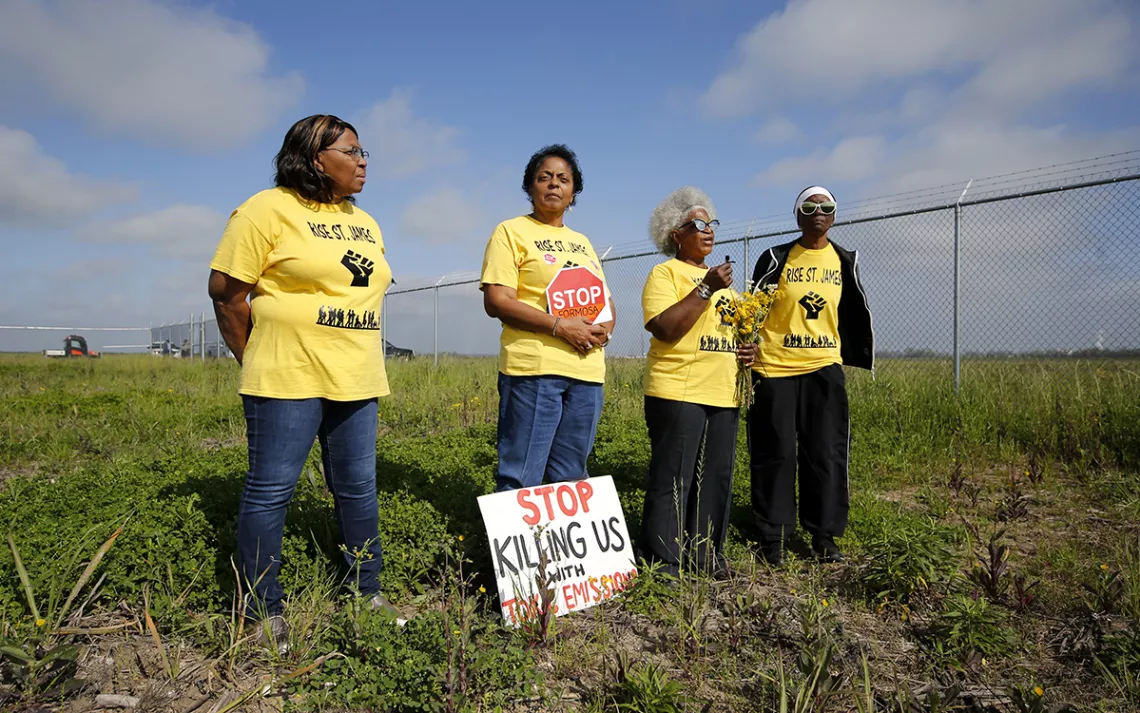 Myrtle Felton, Sharon Lavigne, Gail LeBoeuf, and Rita Cooper of Rise St. James protest the Formosa petrochemical plant, which is planned to be built atop multiple slave cemeteries.