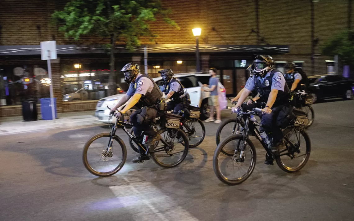 Minneapolis police patrolling on bicycles.
