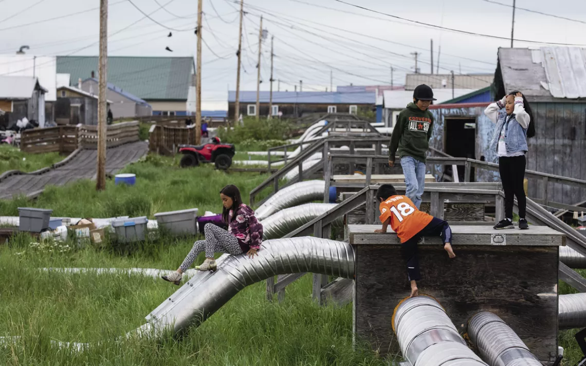 In Selawik, water and sewage lines were built aboveground to accommodate perma­frost.