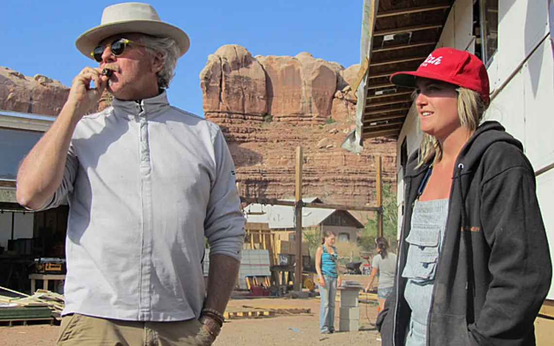 Intern Cindy Bithell with Hank Louis at the DesignBuildBluff compound.