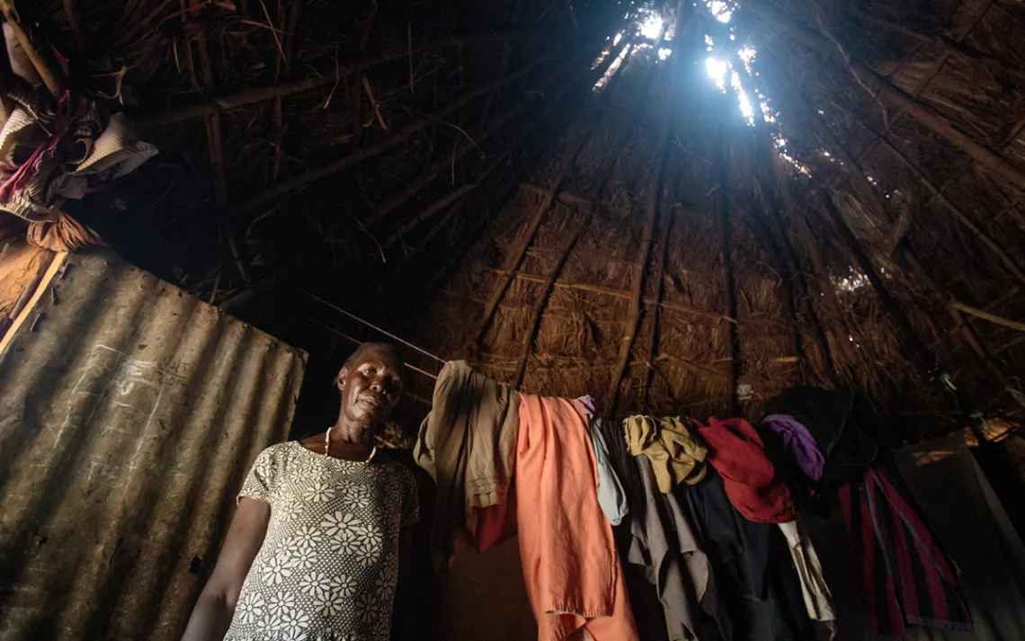 Holes in the roof of village huts are commonplace. The grass used to repair them is a casualty of changing weather.