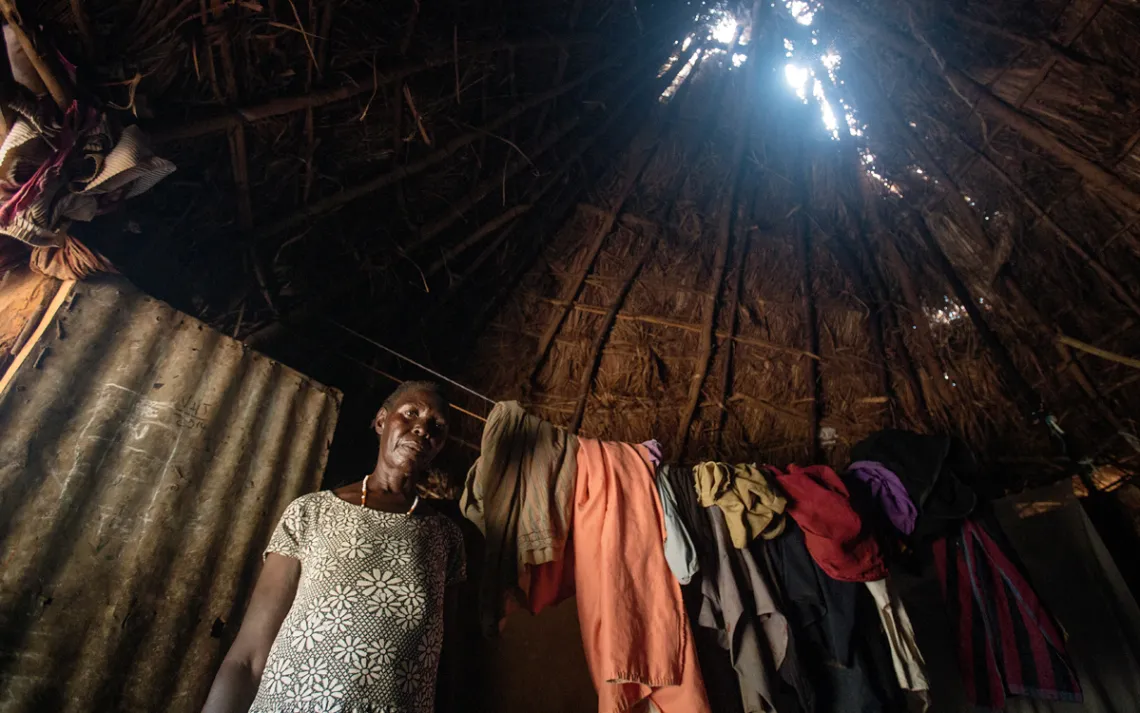 Holes in the roof of village huts are commonplace. The grass used to repair them is a casualty of changing weather.