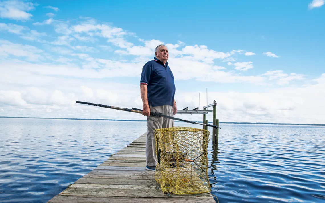 Rick Dove on the dock behind his house near the Neuse River