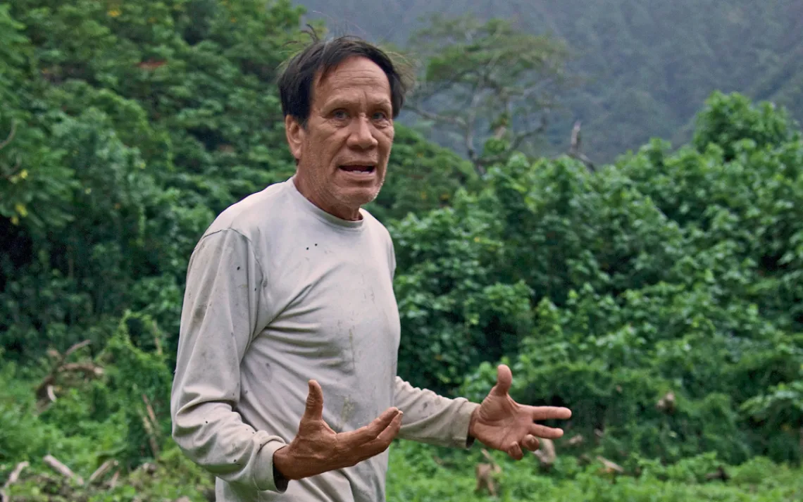Danny Bishop stands atop the remnants of ancient taro complexes in Punalu'u, Oahu.