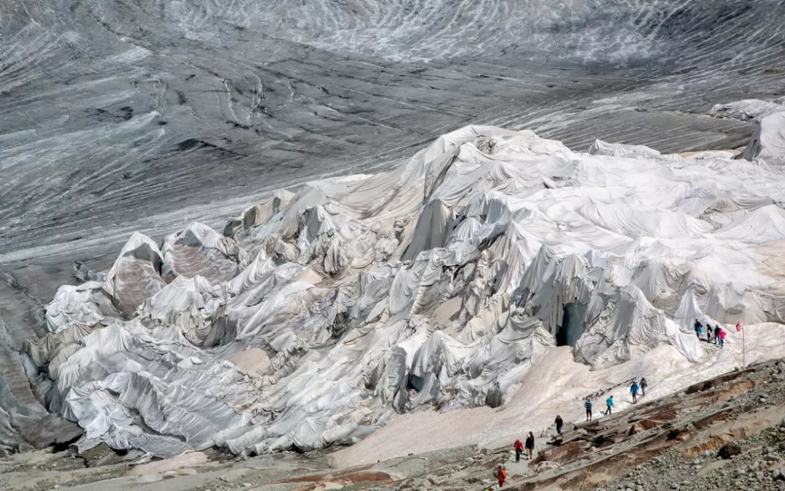 A glacier covered by a blanket