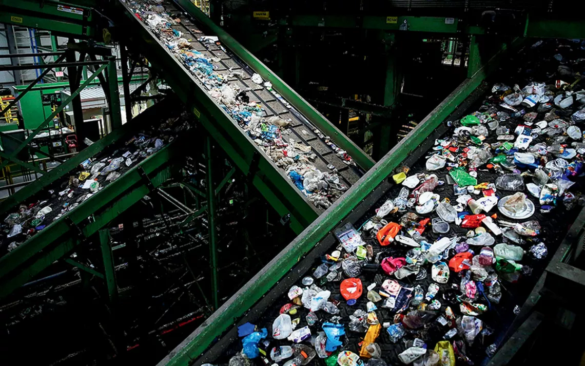 Plastic bags, straws, and wrap frequently clog the conveyor belts at this recycling center in Brooklyn, New York. 
