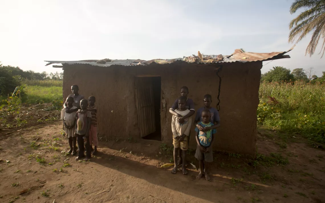 Anyango’s nieces and nephews in front of their hut