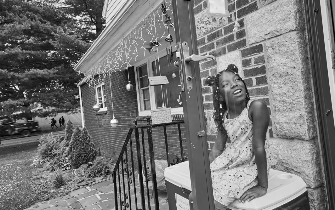 Harlem Valdez outside her home