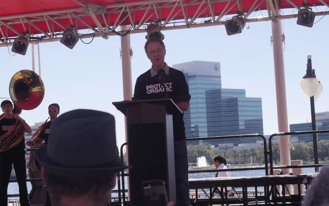 Dave Chapman speaks at a "Protect Organic" rally in Jacksonville, Florida.