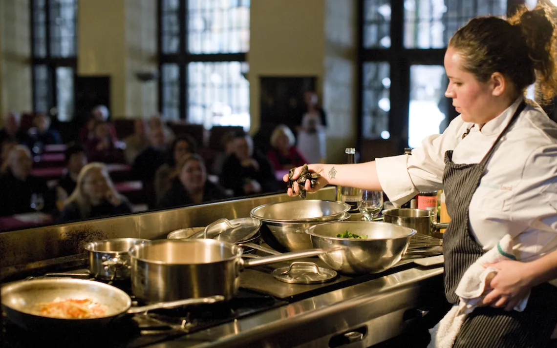 Female chef cooking