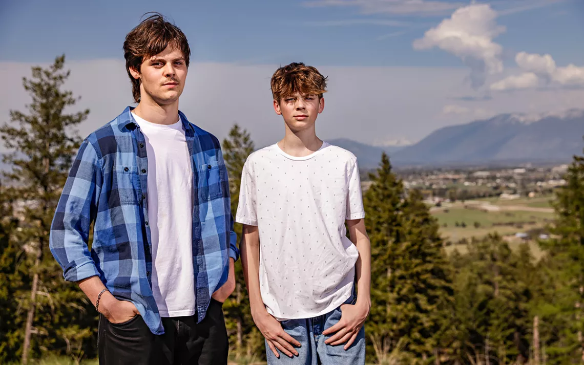 Lander and Badge Busse on a hill near their home overlooking Kalispell on May 3, 2023.