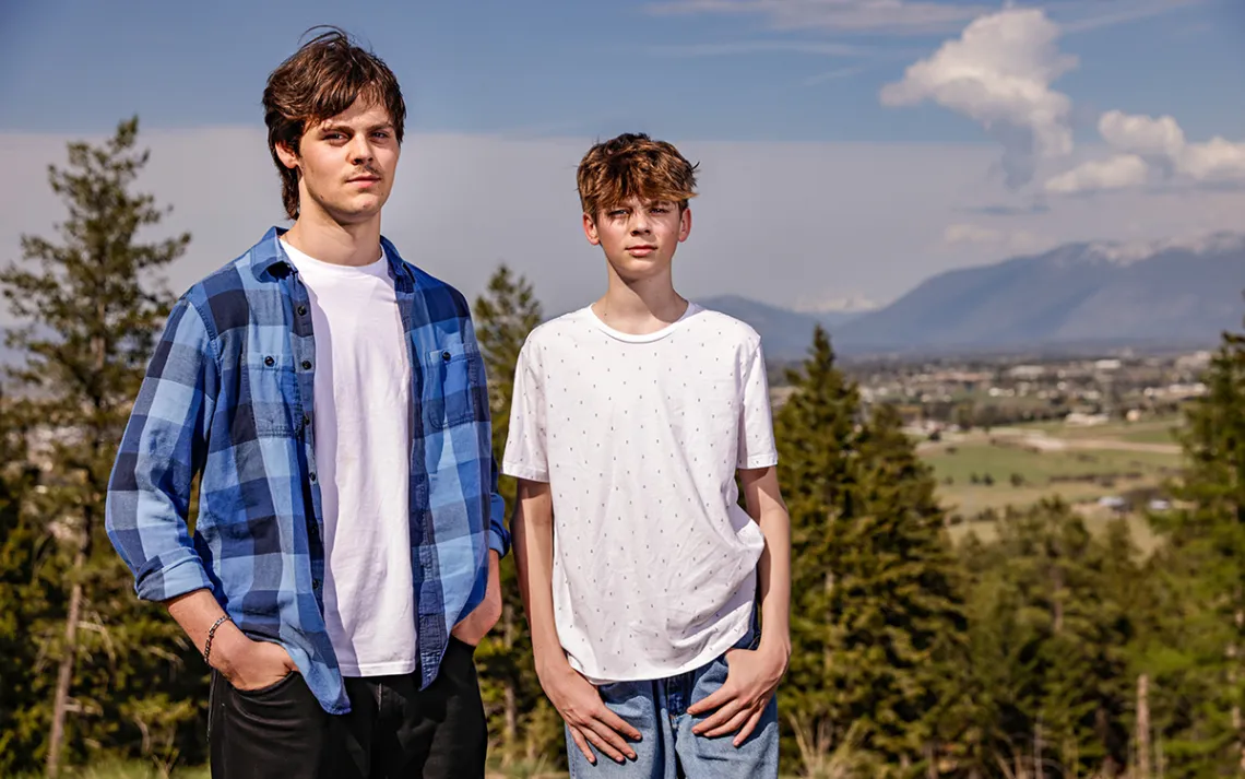 Lander and Badge Busse on a hill near their home overlooking Kalispell on May 3, 2023.