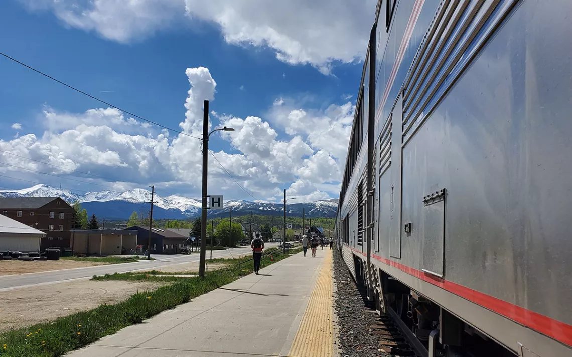 Summer snow in the Rockies as seen from the tracks in Fraser, Colorado.